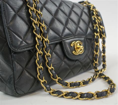 chanel black bag with gold chain|chanel black quilted flap bag.